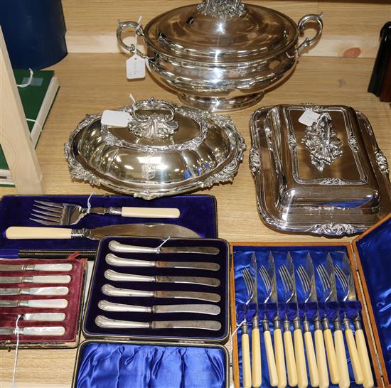 An Elkington plated tureen and cover, two plated entree dishes and sundry cased flatware